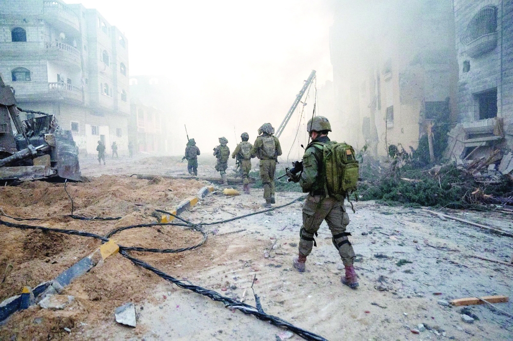Israeli soldiers operate in the Gaza Strip. — Reuters 