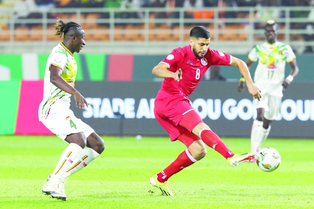 Tunisia's midfielder #8 Hamza Rafia fights for the ball with Mali's midfielder #4 Amadou Haidara during the Africa Cup of Nations. - AFP
