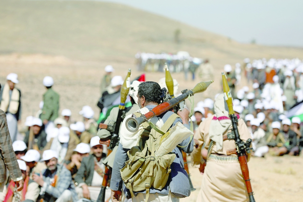 Tribesmen carry RPG launchers during a military parade for new tribal recruits amid escalating tensions with the U.S.-led coalition in the Red Sea, in Bani Hushaish, Yemen. — Reuters 