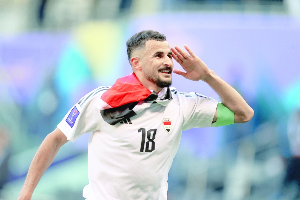 Soccer Football - AFC Asian Cup - Group D - Iraq v Vietnam - Jassim bin Hamad Stadium, Al Rayyan, Qatar - January 24, 2024  Iraq's Ayman Hussein celebrates after the match REUTERS/Ibraheem Al Omari