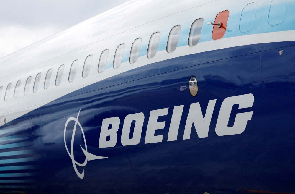 The Boeing logo is seen at the Farnborough International Airshow, in Farnboroug