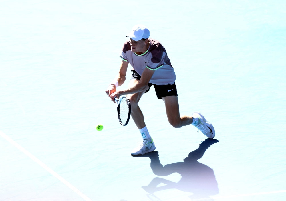 Tennis - Australian Open - Melbourne Park, Melbourne, Australia - January 26, 2024 Italy's Jannik Sinner in action during his semifinal match against Serbia's Novak Djokovic 