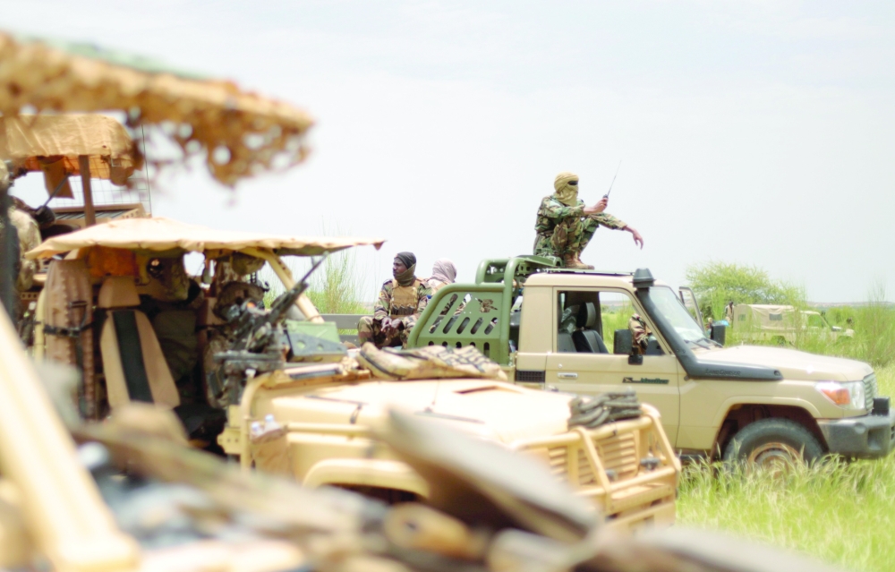 Malian soldiers are pictured during a patrol near Niger border in Dansongo Circle, Mali. — Reuters file photo 