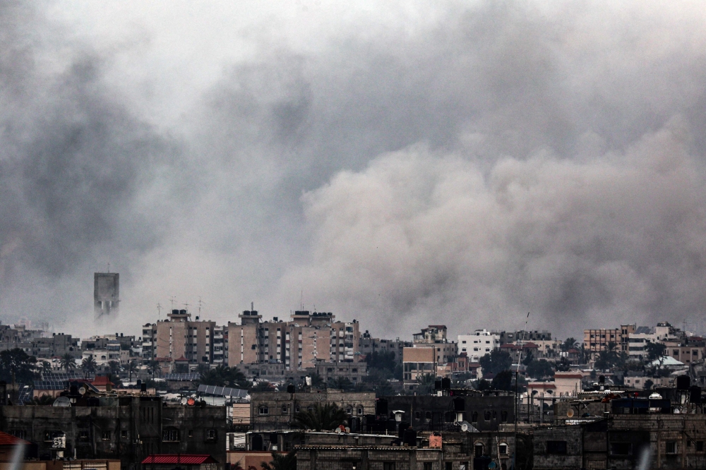 Smoke billows during an Israeli strike in Rafah in the southern Gaza Strip on January 28, 2024