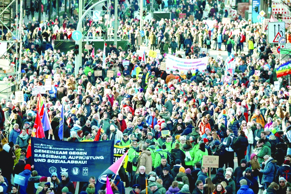 Protesters take part in a demonstration against racism and far-right politics in Hamburg, northern Germany. - AFP
