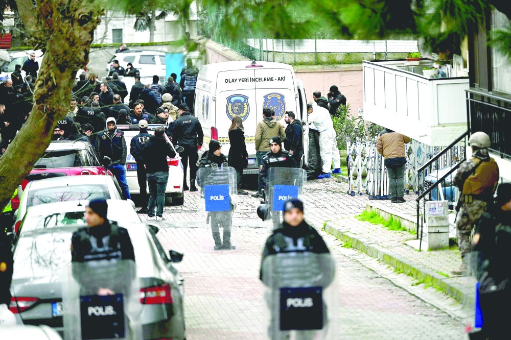 Turkish forensic police stand in front of Santa Maria church after an attack, in Istanbul. — AFP 