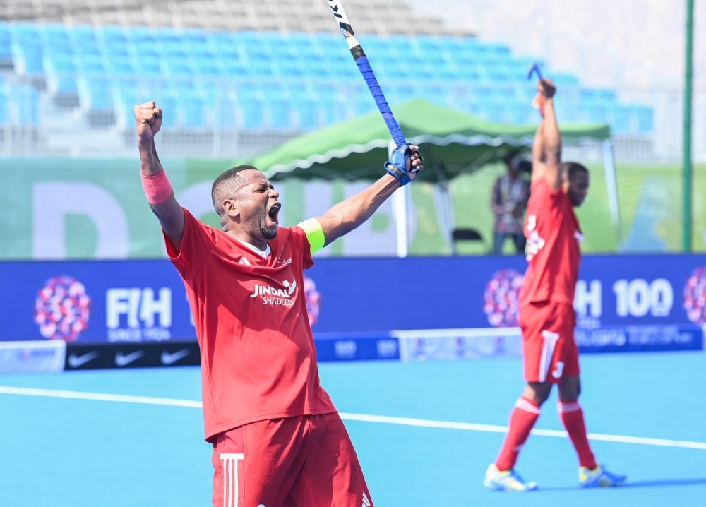 Oman players celebrate their win against the US