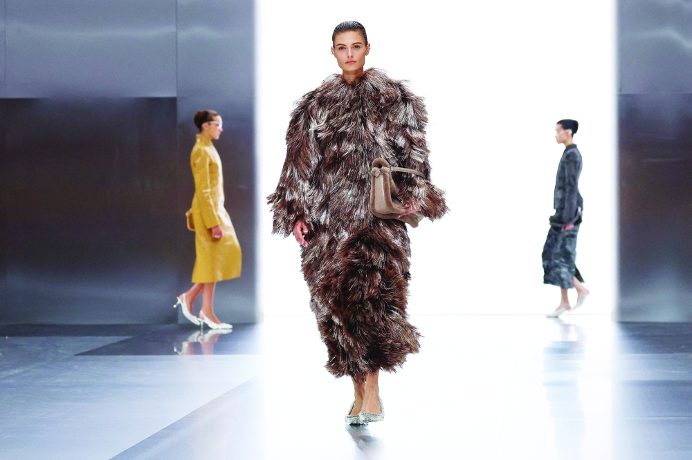 Models present creations by Fendi during the Women's Haute-Couture Spring/Summer 2024 shows as part of the Paris Fashion Week at the Palais Brongniart in Paris, on January 25, 2024.