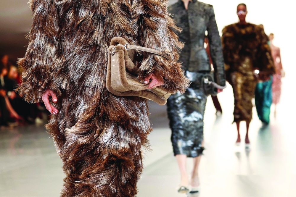 Models present creations by Fendi during the Women's Haute-Couture Spring/Summer 2024 show as part of the Paris Fashion Week at the Palais Brongniart in Paris, on January 25, 2024.