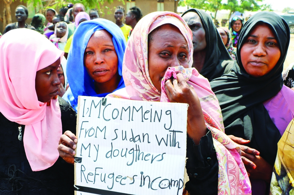 Sudanese refugees react at the Gorom Refugee camp hosting Sudanese refugees who fled recent fighting, near Juba, in South Sudan. — Reuters 