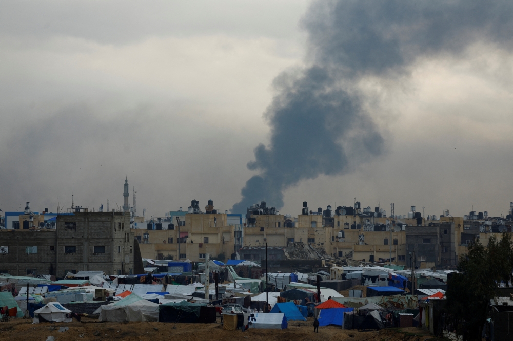 Smoke rises during an Israeli ground offensive, in Khan Younis, as seen from Rafah. — Reuters