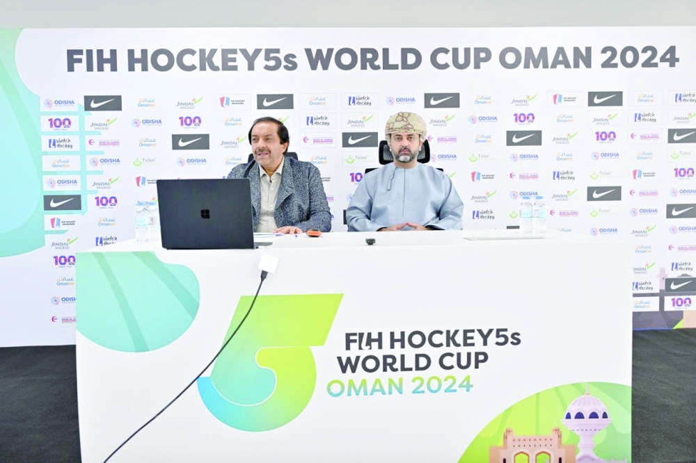 FIH President Tayyab Ikram and OHA Chairman Dr Marwan al Juma address a press conference.