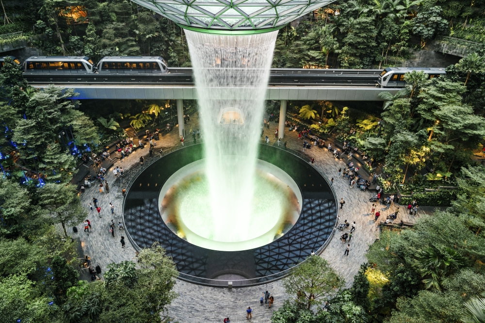 A garden and shopping area at Changi Airport in Singapore, Dec. 25, 2023. (Lauryn Ishak/The New York Times)