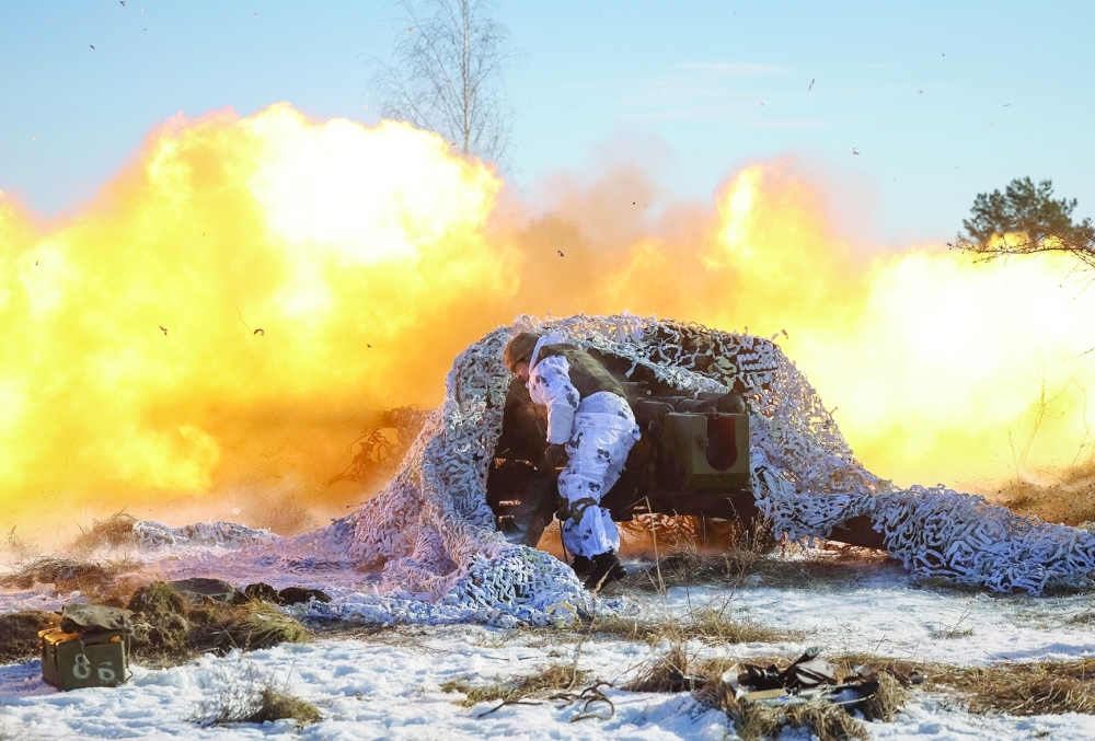 A Ukrainian serviceman fires a cannon during military exercises, amid Russia's attack on Ukraine, in Zhytomyr region, Ukraine. — Reuters 