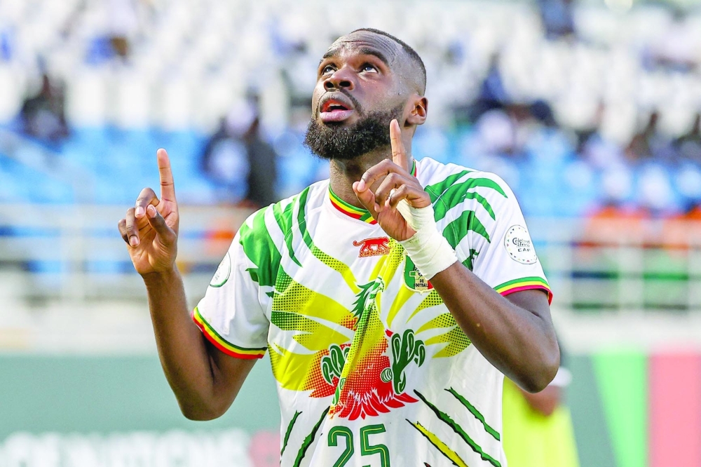 Mali's forward #25 Lassine Sinayoko celebrates after scoring his team's second goal during the Africa Cup of Nations (CAN) 2024 round of 16 football match between Mali and Burkina Faso at the Amadou Gon Coulibaly Stadium in Korhogo on January 30, 2024. 