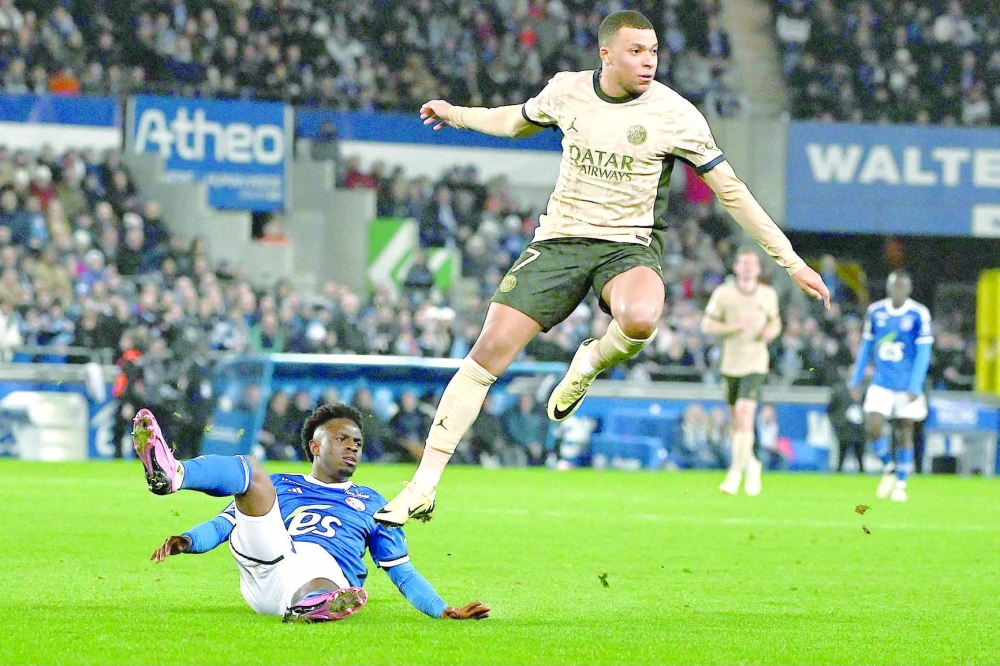 Kylian Mbappe compete in the match between RC Strasbourg (RCS) and Paris Saint-Germain (PSG).— AFP