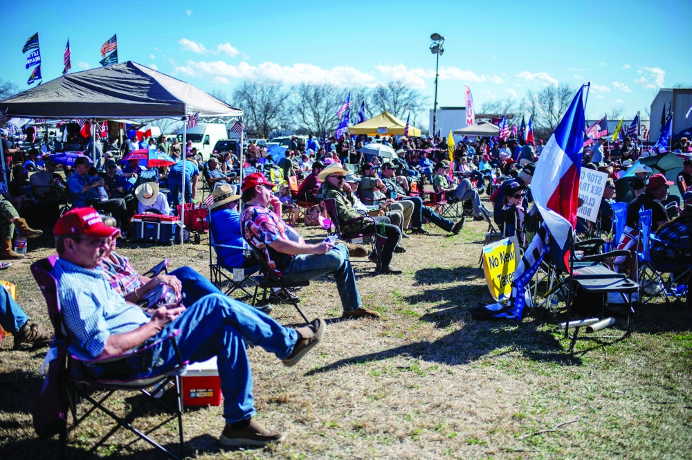 Attendees listen to a speech at the Take Back Our Border Convoy rally at Cornerstone Childrens Ranch on February 3, near Quemado, Texas. — AFP 