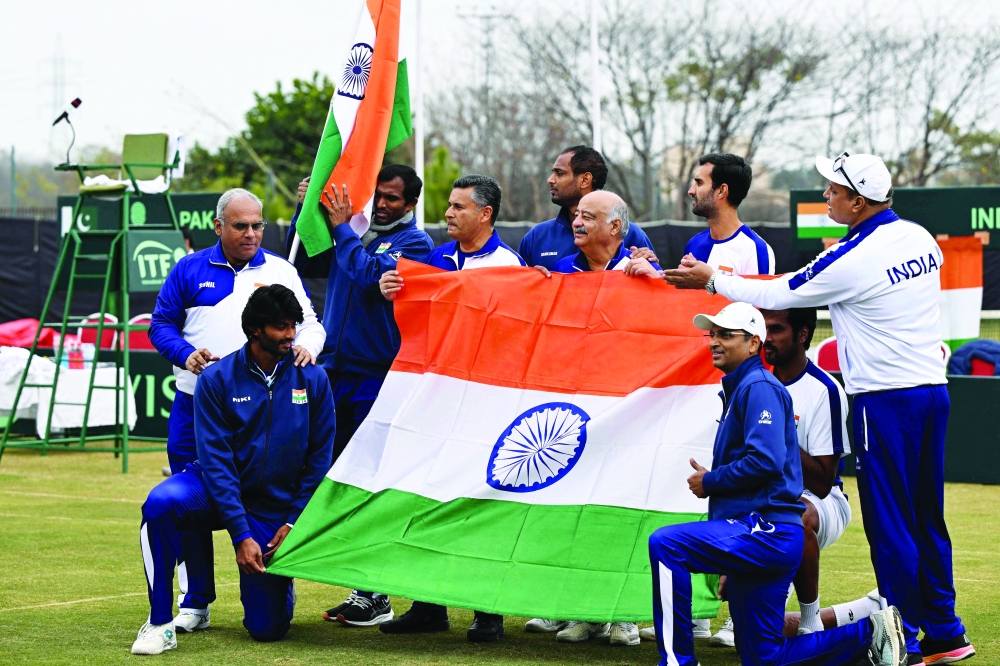 India team celebrates after defeating Pakistan team.— AFP

