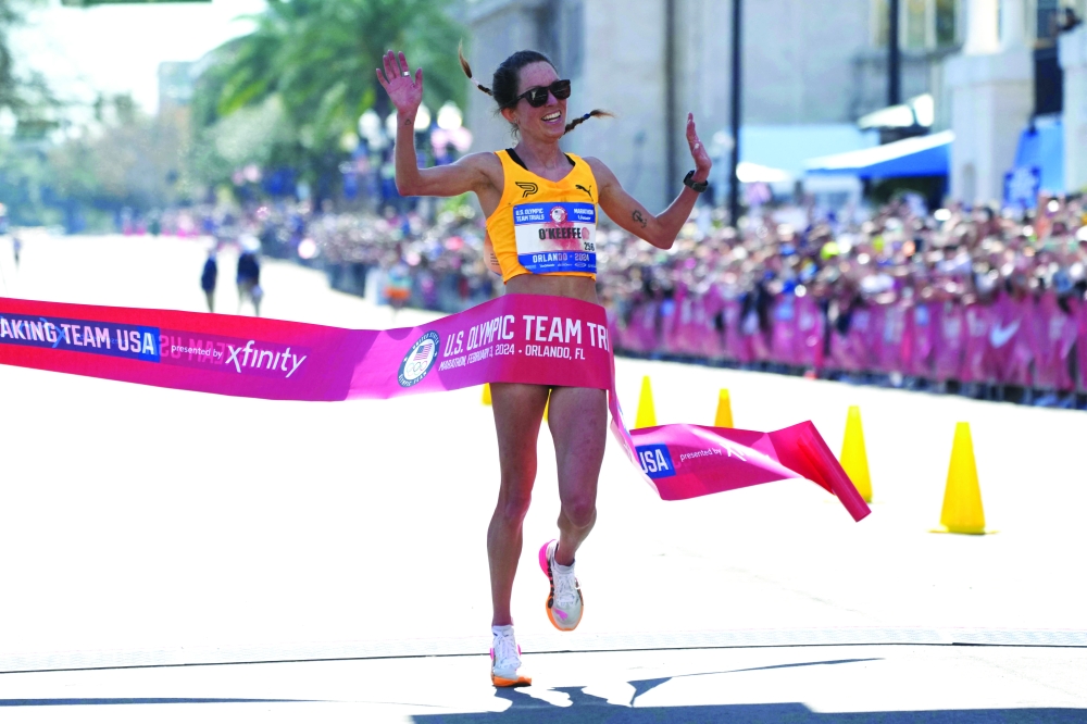 Fiona O'Keefe celebrates after winning the women's race.—USA TODAY Sports
