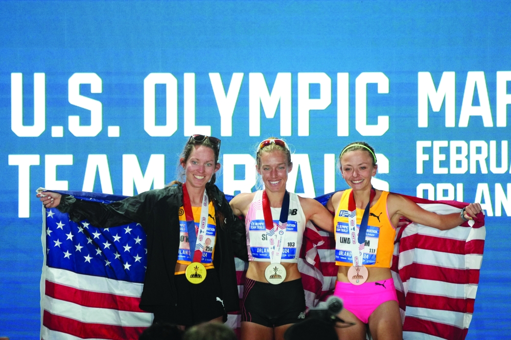 The top three finishers, Emily Sisson (second), Fiona O'Keefe (first) and Dakotah Lindwurm.— USA TODAY Sports
