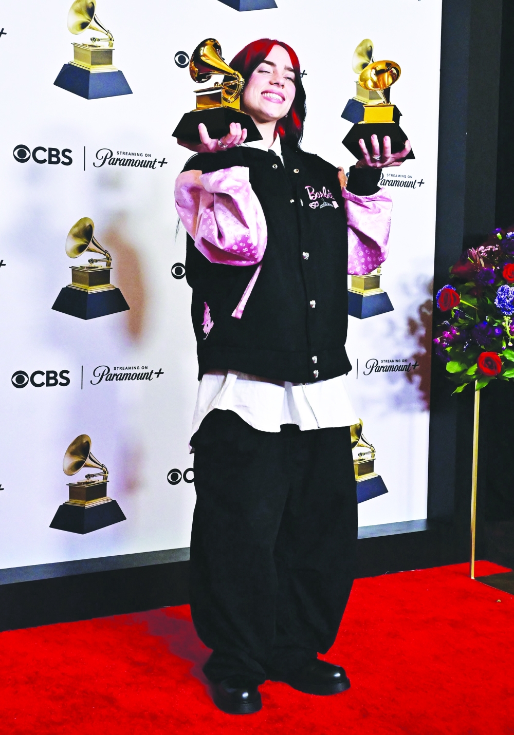 US singer-songwriter Billie Eilish poses in the press room with the Grammys for Song of the Year and Best Song Written Visual Media for "What Was I Made For?" during the 66th Annual Grammy Awards at the Crypto.com Arena in Los Angeles on February 4, 2024.