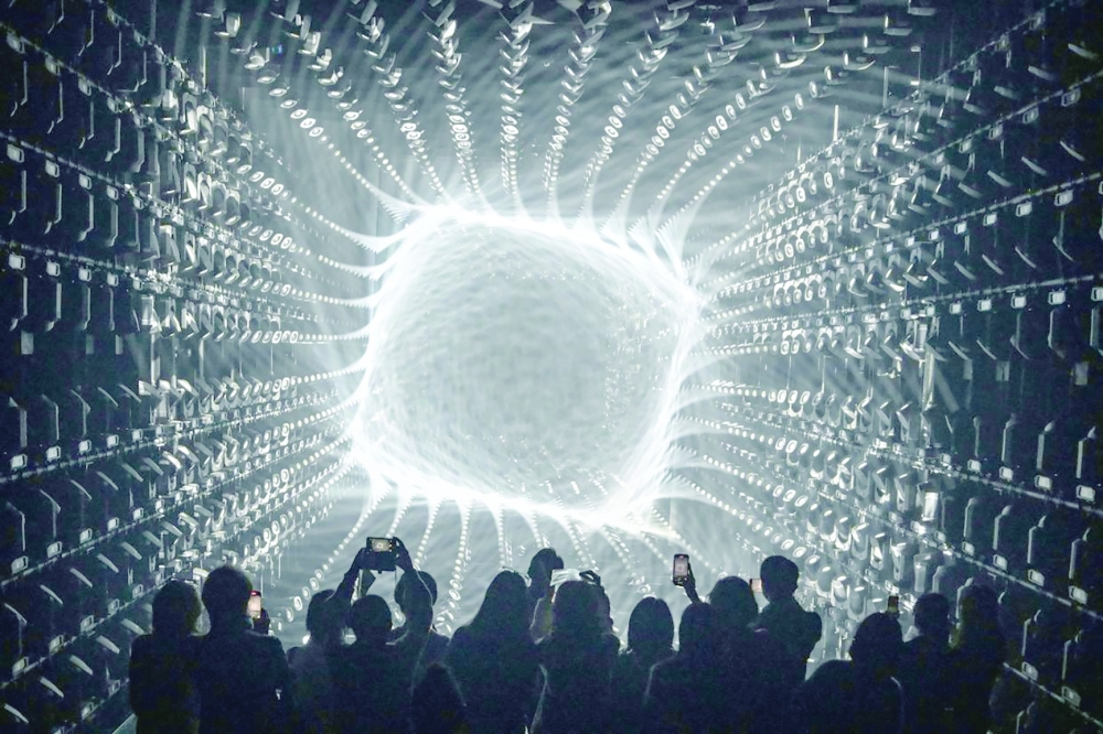 Cascading light and 'wobbling' orbs at new Tokyo art museum