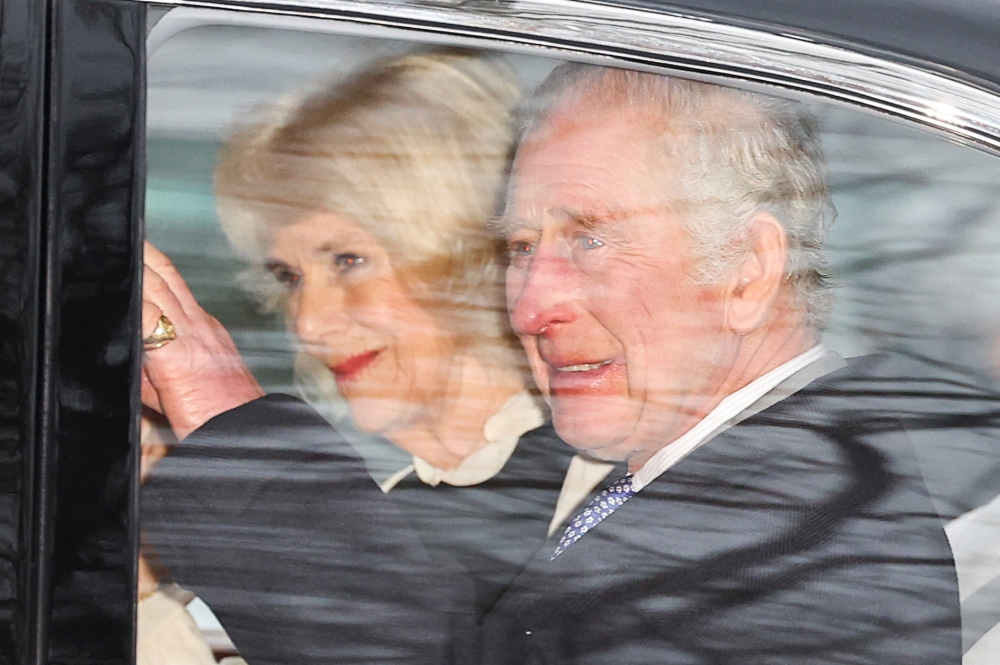 Britain's King Charles and Queen Camilla leave Clarence House