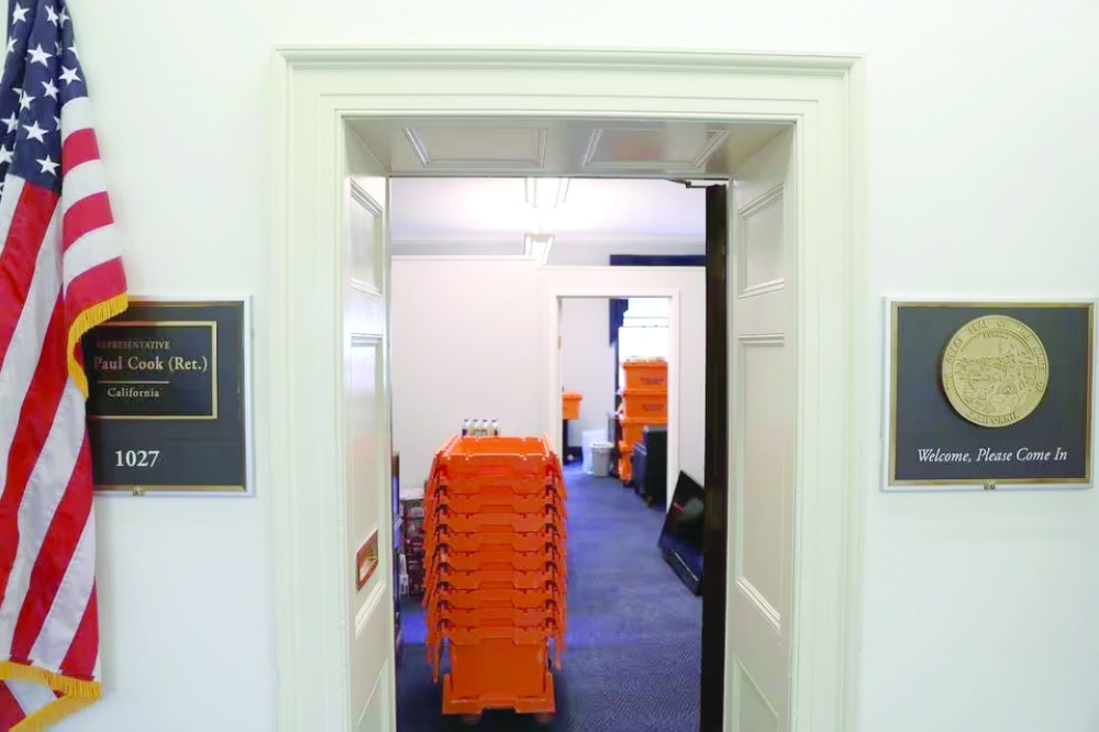 Stacks of moving crates sit in a U.S. Congressional office weeks before the end of the current term. — Reuters