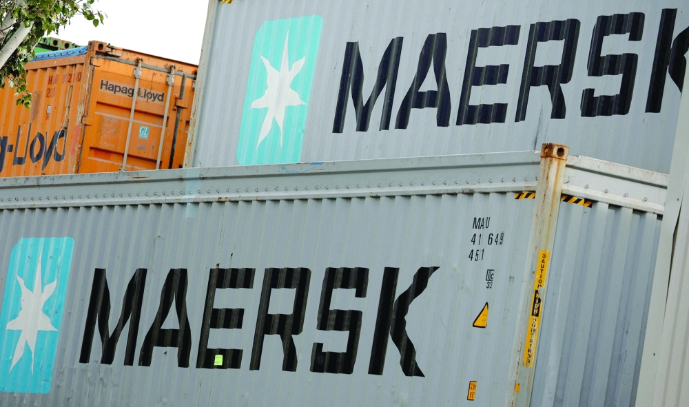 Maersk's logo is seen in stored containers at Zona Franca in Barcelona. - Reuters