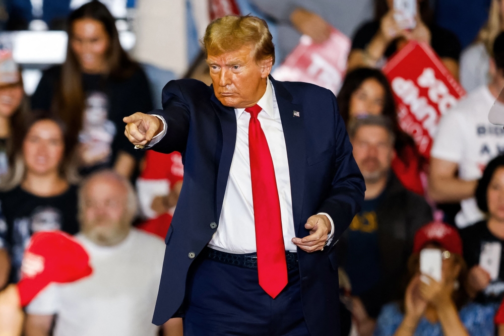 Former US President and 2024 presidential hopeful Donald Trump attends a 'Get Out the Vote' Rally in Conway, South Carolina. - AFP
