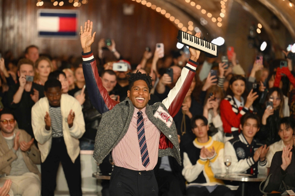 US musician and singer Jon Batiste performs on the runway at Tommy Hilfiger's Fall/Winter 2024 collection during New York Fashion Week at Grand Central Station in New York City on February 9, 2024.