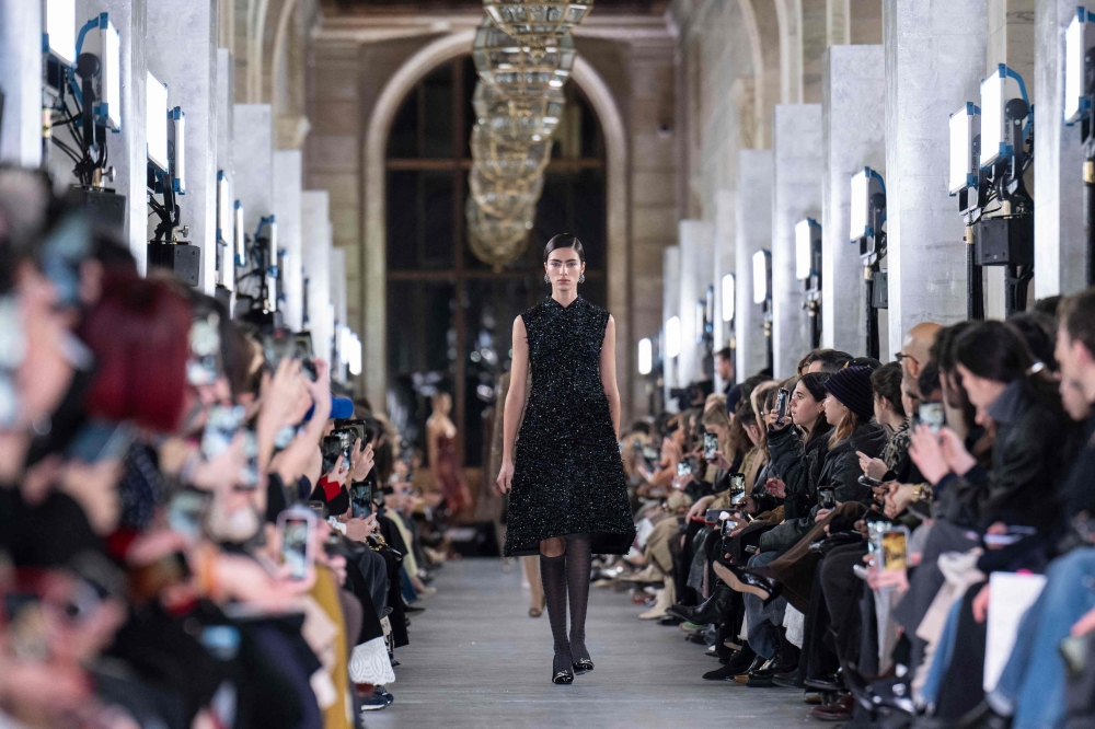 TOPSHOT - A model walks the runway for the Tory Burch show during New York Fashion Week on February 12, 2024 in New York.  (Photo by ANGELA WEISS / AFP)

