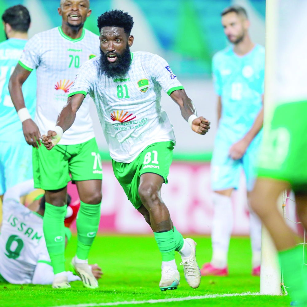 Al Nahdha player,Gui Inters celebrates the goal