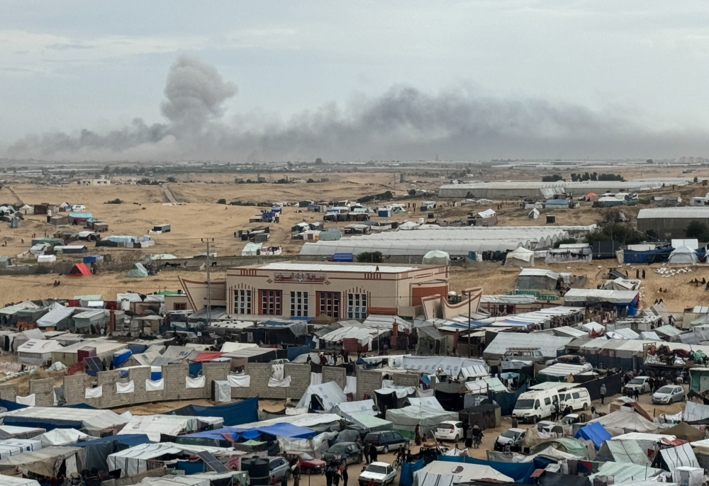 Smoke rises during an Israeli ground operation in Khan Younis, as seen from a tent camp sheltering displaced Palestinians in Rafah. — Reuters 