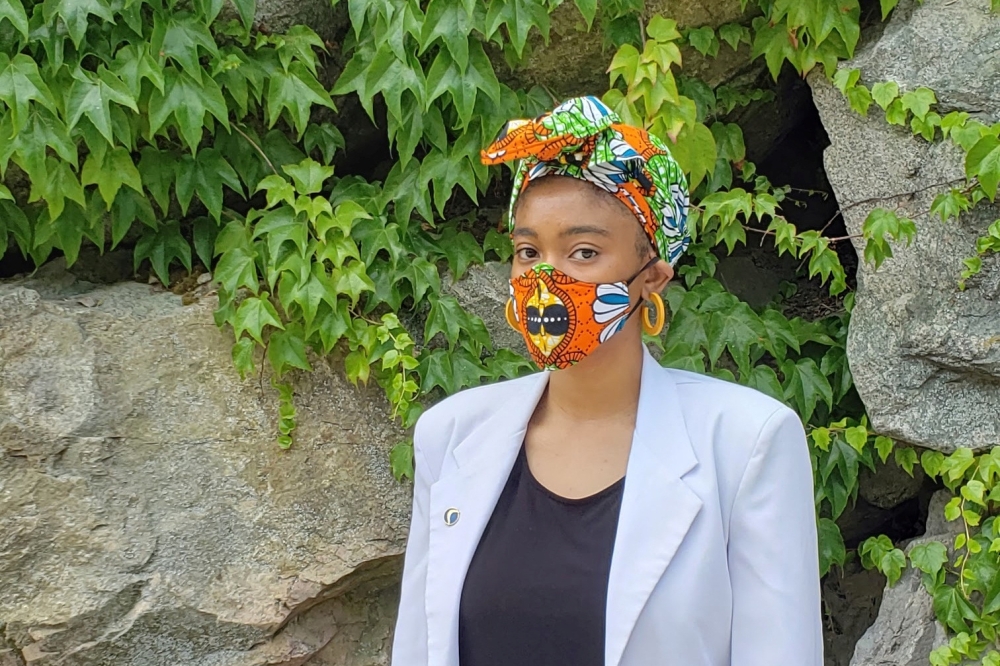 A  poses with a mask to protect Covid from virus