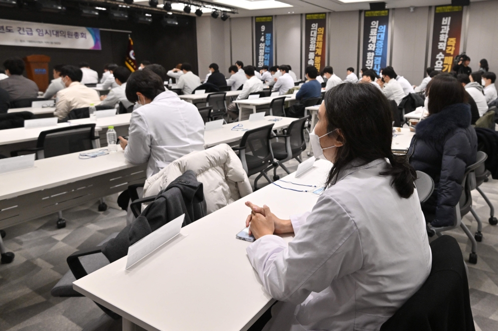 Trainee doctors attend an emergency meeting at the Korean Medical Association building, Seoul. — AFP