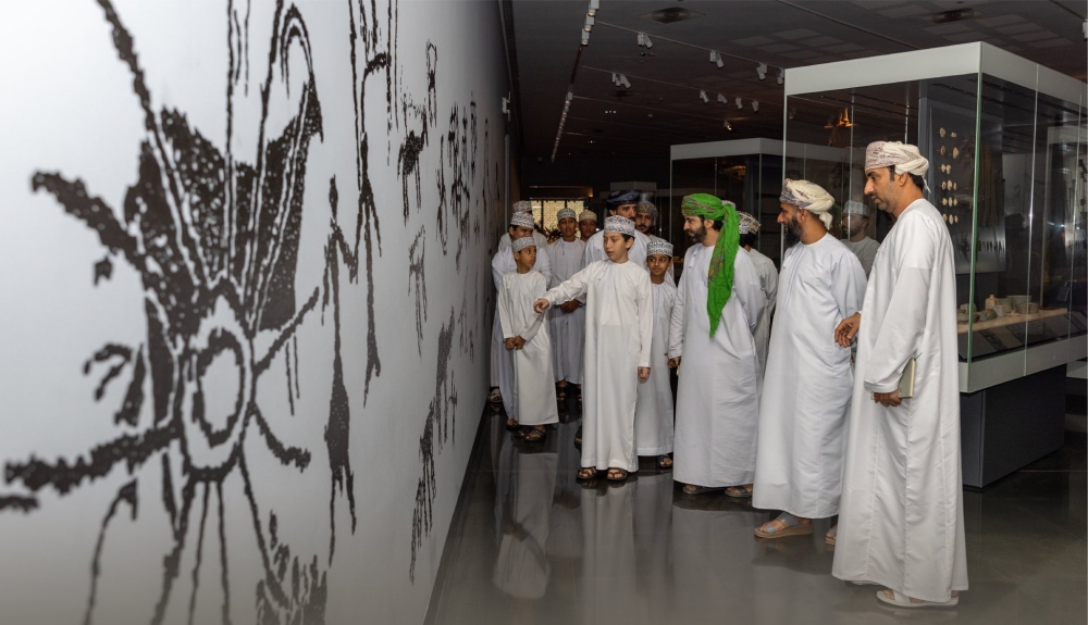 Students learn about rock engravings at the National Museum in Muscat on Tuesday