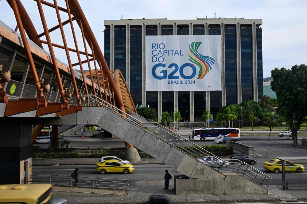 A G20 Brazil banner is displayed at the Rio de Janeiro city hall building in Rio de Janeiro, Brazil. — AFP file photo 