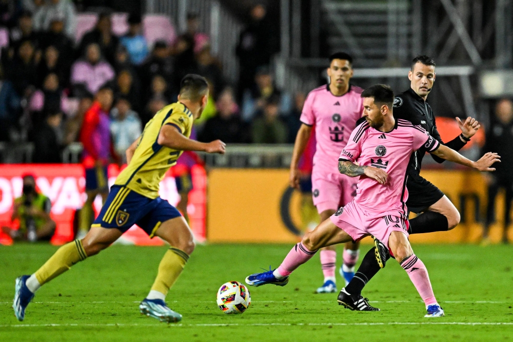 Inter Miami's Argentine forward #10 Lionel Messi controls the ball during the MLS football match between Inter Miami and Real Salt Lake at Chase Stadium
