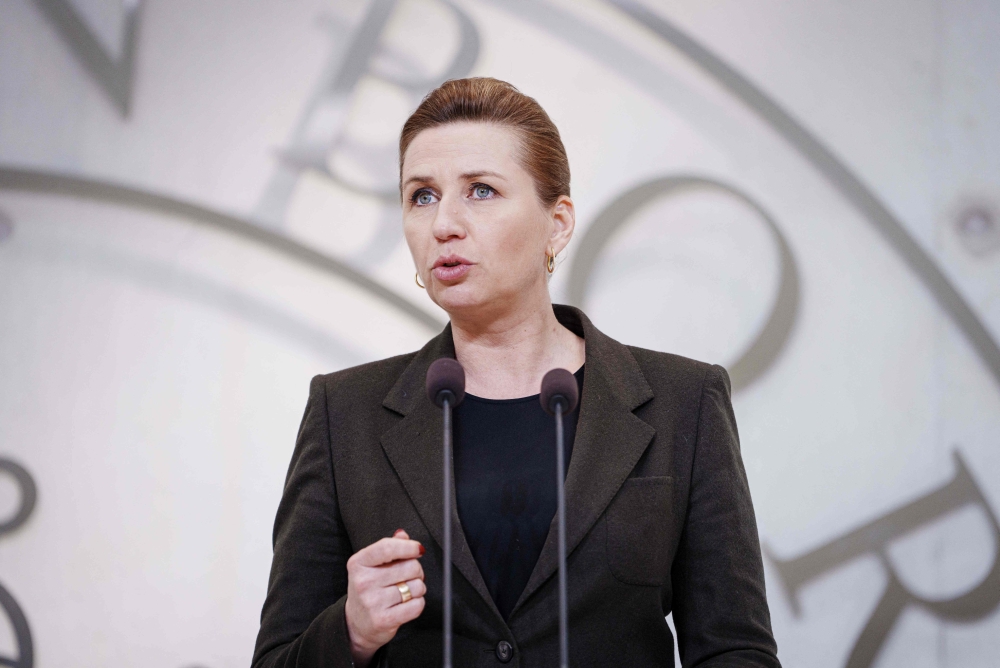 Danish Prime Minister Mette Frederiksen speaks during a press conference in Copenhagen