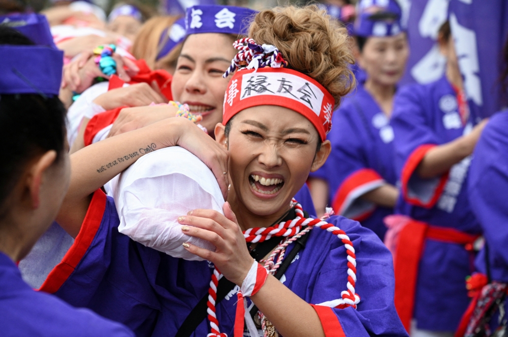 Women take part in the naked festival at Owari Okunitama Shrine in Inazawa