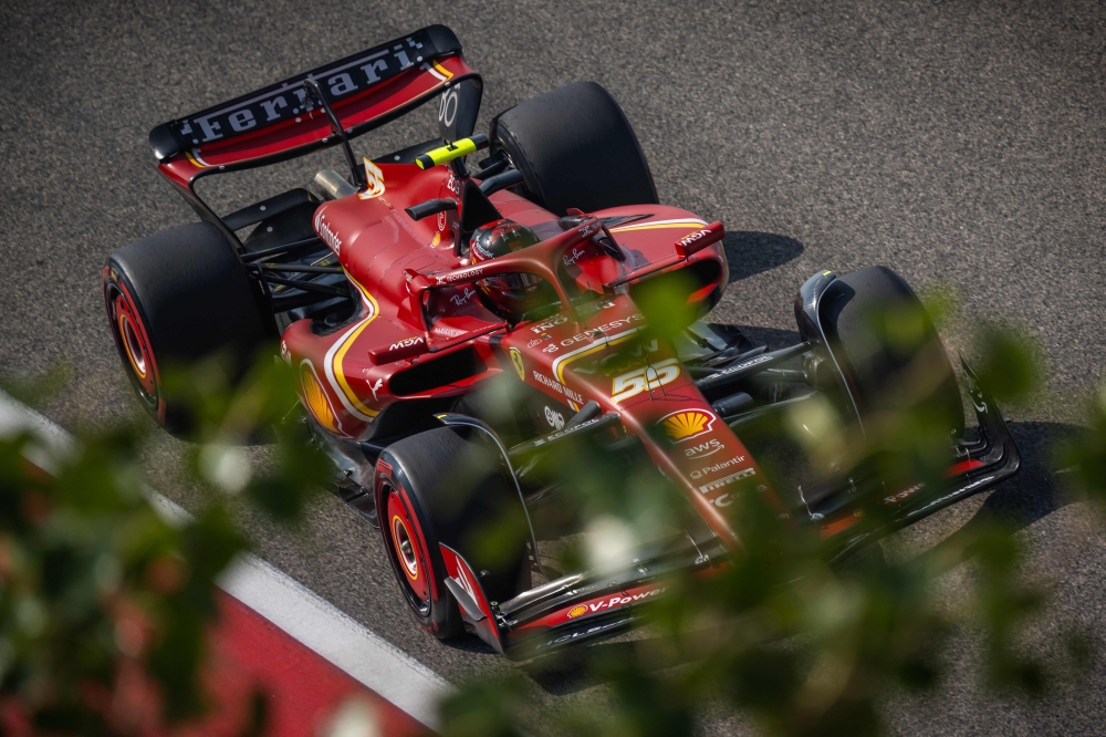 Ferrari's Spanish driver Carlos Sainz Jr drives during the third day of the Formula One pre-season testing at the Bahrain International Circuit in Sakhir on February 23, 2024. (Photo by Andrej ISAKOVIC / AFP)

