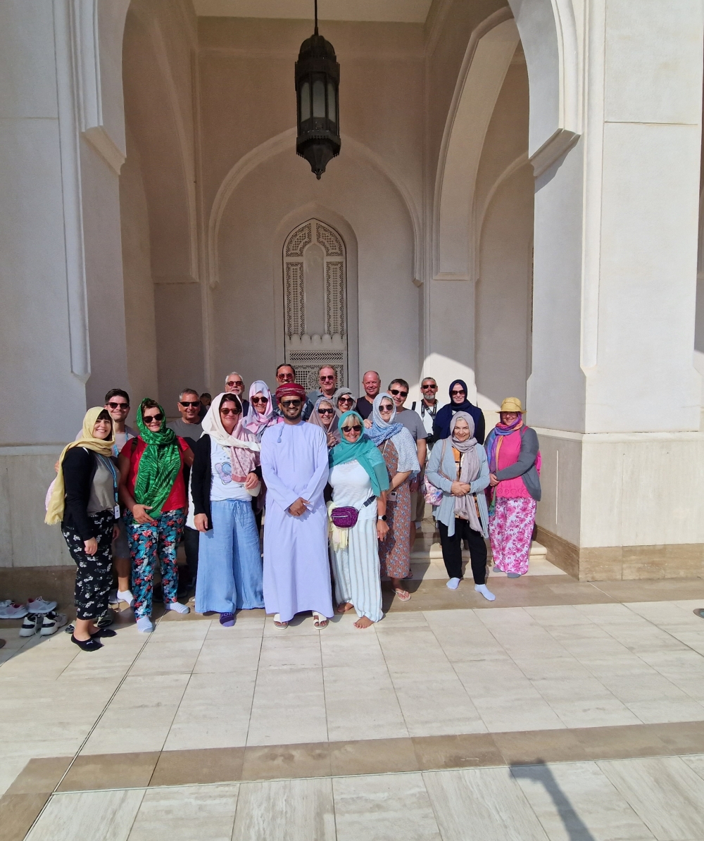 Tour operator Abdullah Subah with cruise line tourists from Europe, Germany  