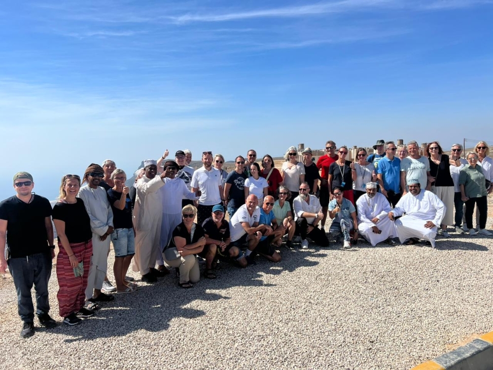 Tour operator Abdullah Subah with cruise line tourists from Europe, Germany  