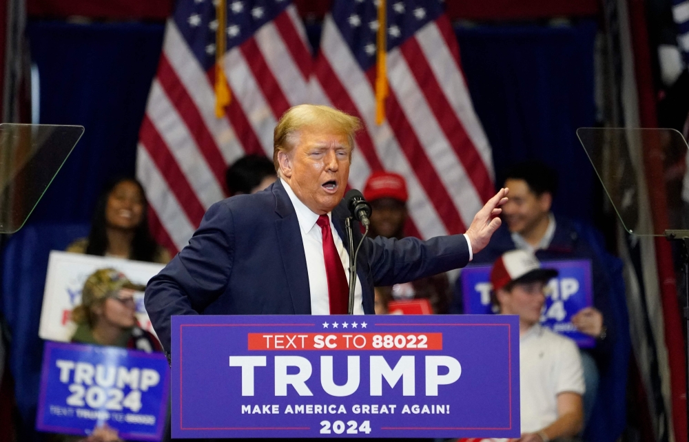 Former US President Donald Trump gestures as he speaks at a "Get Out the Vote" rally at the Winthrop Coliseum in Rock Hill, South Carolina. — AFP 