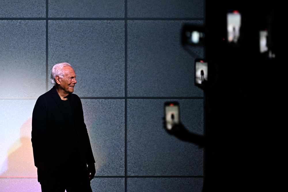 Italian designer Giorgio Armani greets the audience at the end of his collection show at the Milan Fashion Week Womenswear Autumn/Winter 2024-2025 on February 25, 2024 in Milan.  
