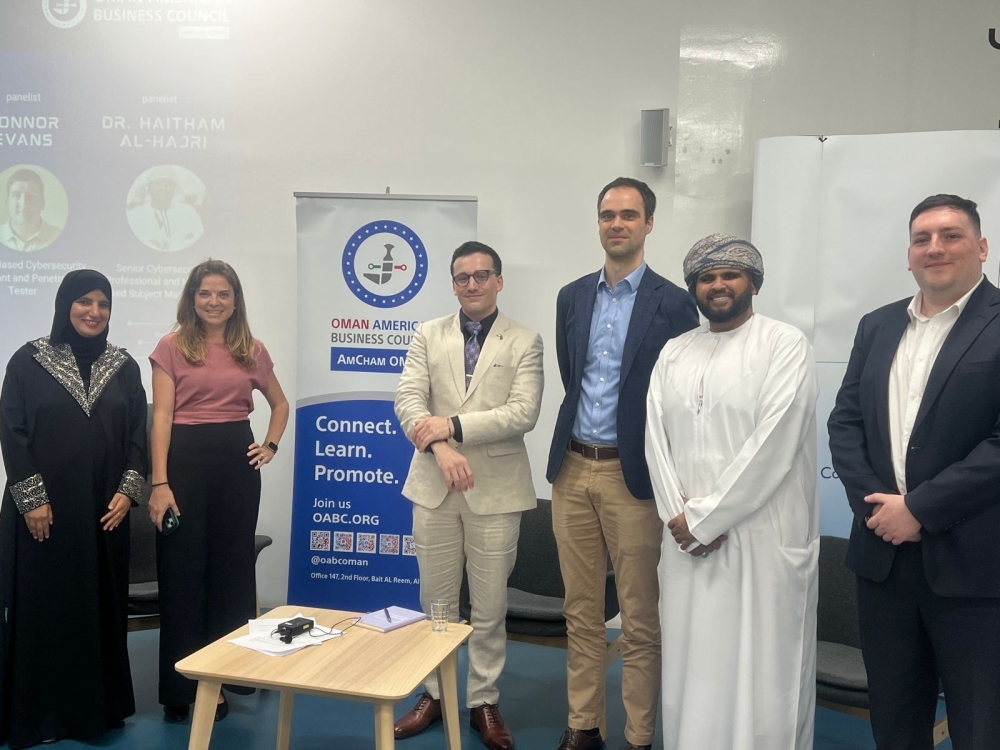 Sara al Kindi, OABC Chairperson Rebecca Olson, James Shires, Benjamin Lotto, Haitham al Hajri, and Connor Evans pose for a photo after the event.