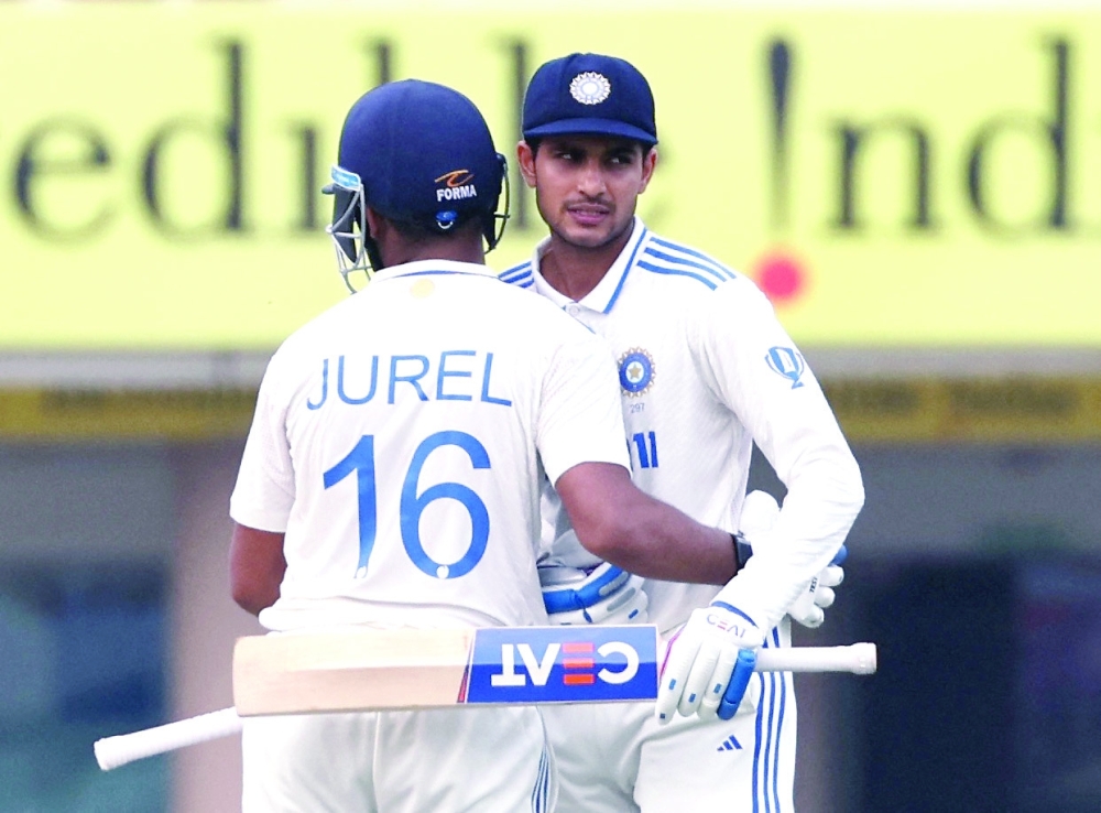 India's Shubman Gill and Dhruv Jurel celebrate after the match REU