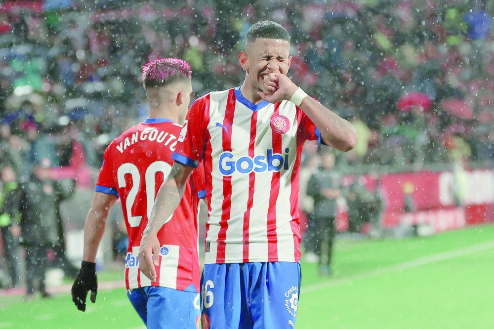  Savio Moreira celebrates after scoring his team's third goal AFP