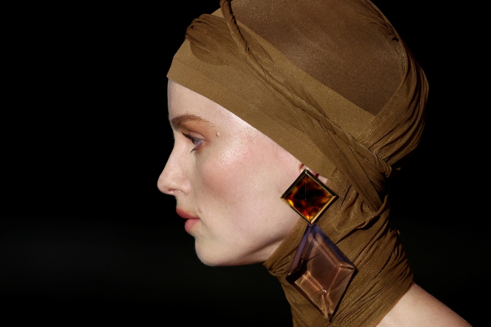 A model presents a creation by designer Anthony Vaccarello as part of his Fall-Winter 2024/2025 Women's ready-to-wear collection show for fashion house Saint Laurent during Paris Fashion Week, in Paris, France, February 27, 2024. REUTERS/Gonzalo Fuentes
